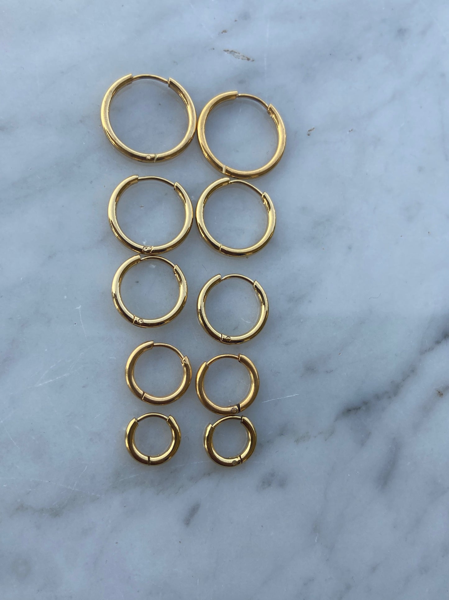 CrescendoIntroducing our Crescendo Earrings in 18K gold plating. These exquisite earrings embody timeless elegance and luxurious style. Crafted with meticulous attention to dStainless SteelCrescendo
